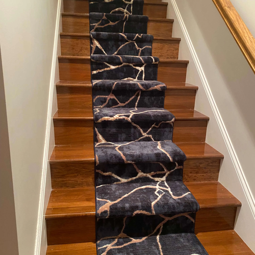 Patterned carpet stair runner by McCools Flooring