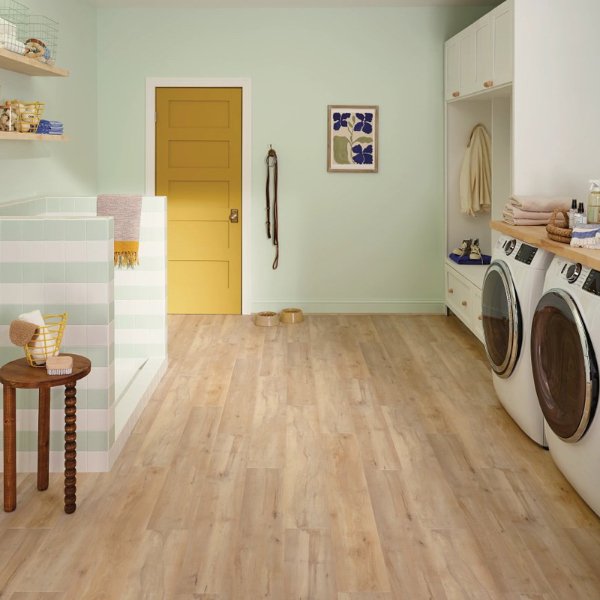 Family home with wood flooring in a laundry room