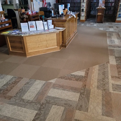 Commercial carpet tile floors in a library by McCools Flooring