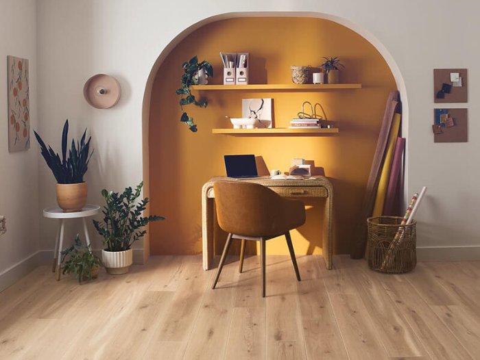 Creative office nook in a stylish home with wood floors