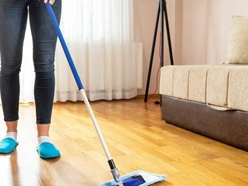 Mopping laminate floor in a Carmel IN home